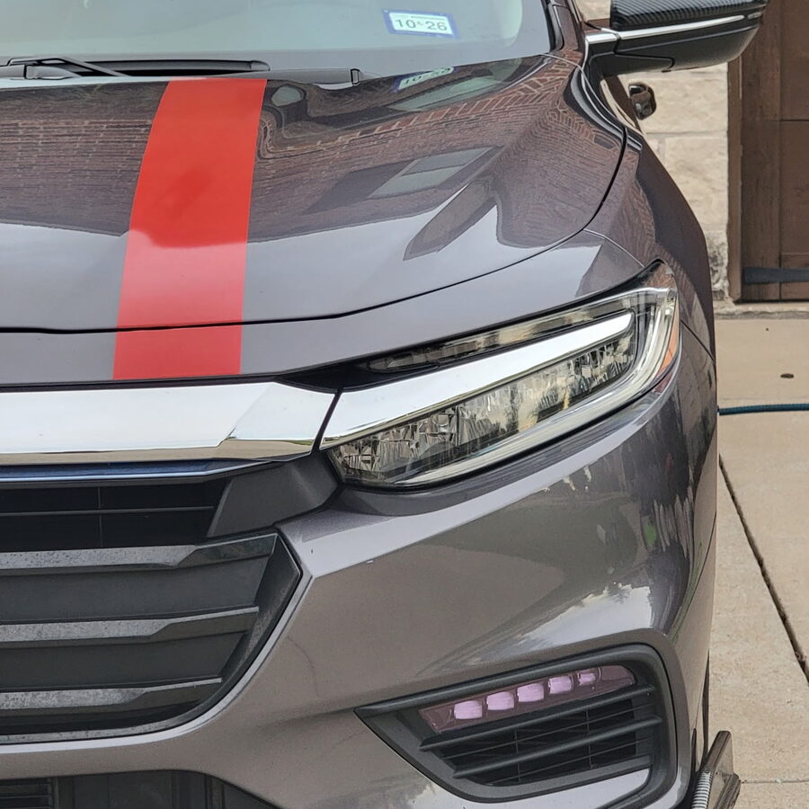Honda Insight front closeup — gloss finish