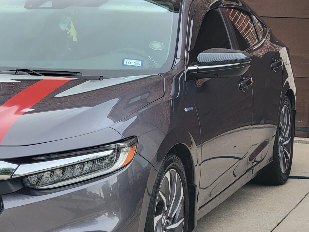 Honda Insight side profile — showroom finish