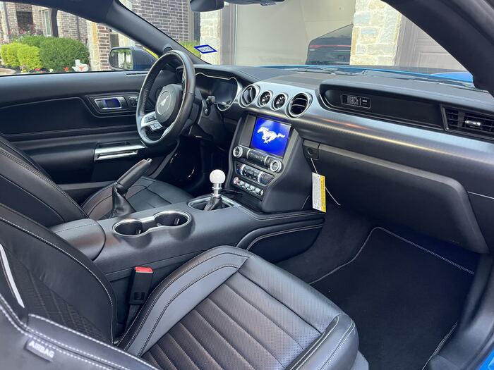 Mustang Mach 1 passenger interior detail — clean console and infotainment